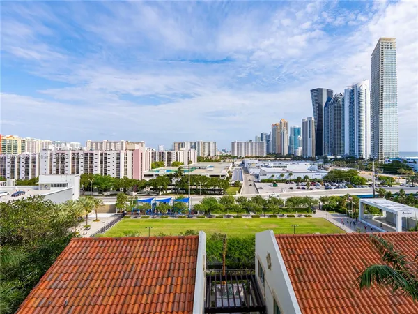 a view of a city with tall buildings