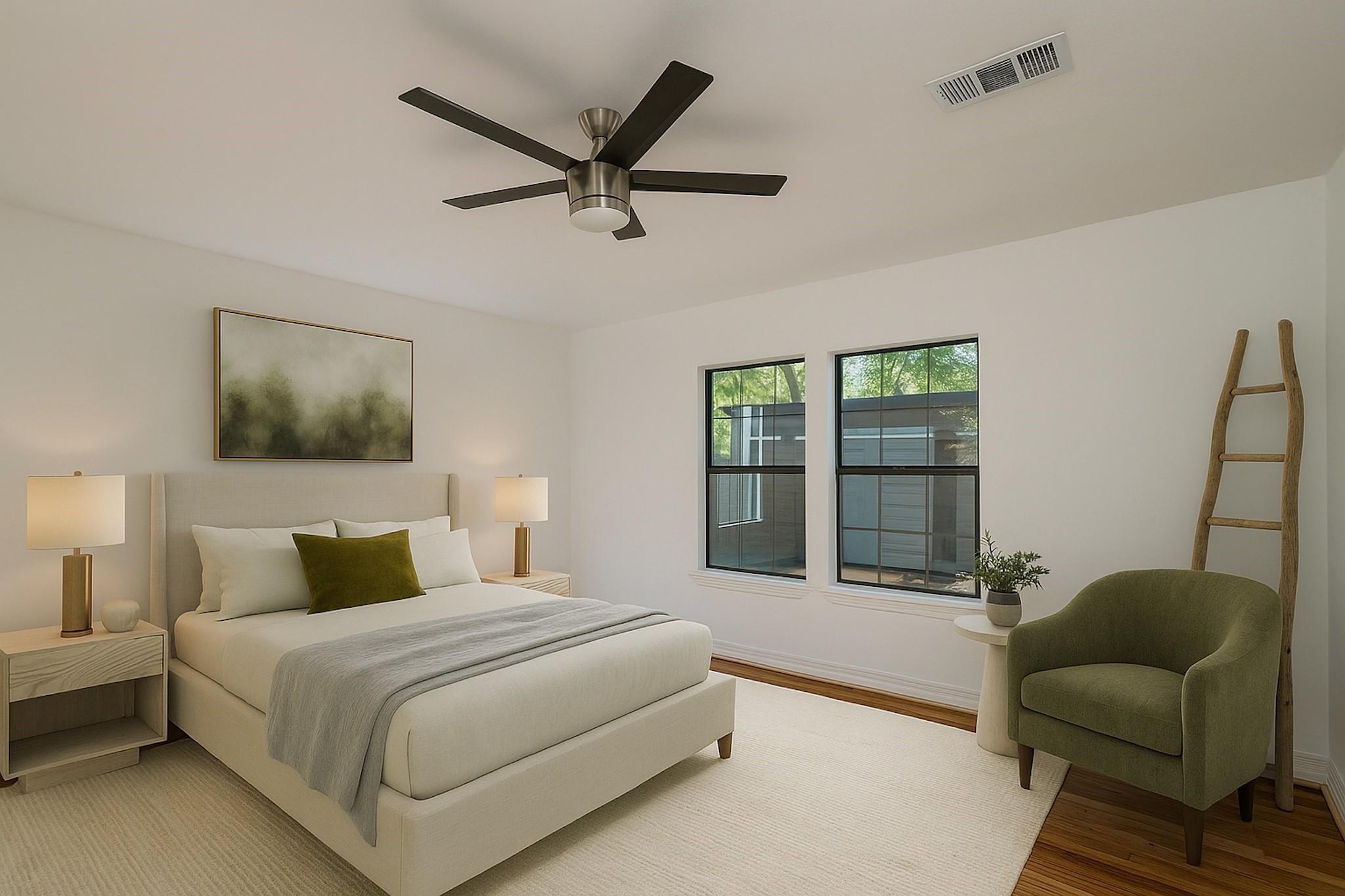 2308 Blodgett Street Houston, TX 77004 - Photo 14 of 23 a bedroom with a large bed and a couch