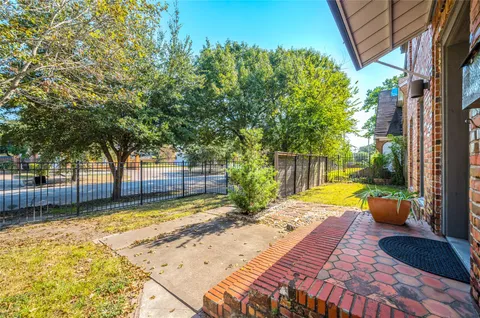 a view of a backyard with a small pool