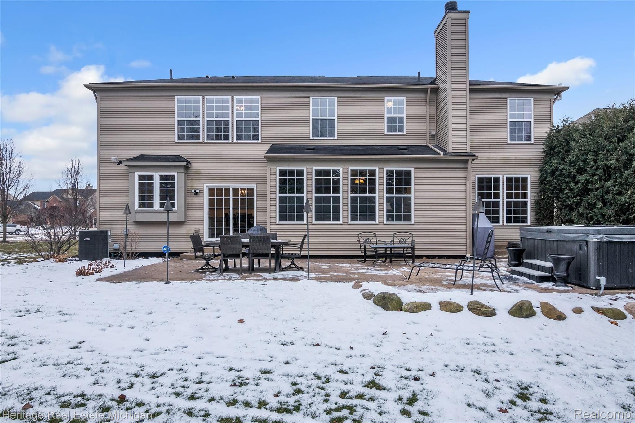 4274 Merriman Loop Howell, MI 48843 - Photo 63 of 66 Back view of home
