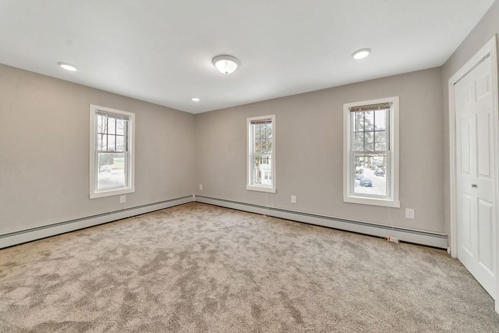 402 Allen Street Springfield, MA 01118 - Photo 16 of 28 a view of an empty room with a window