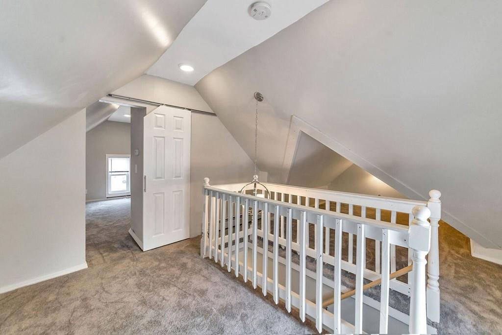 402 Allen Street Springfield, MA 01118 - Photo 21 of 28 a view of staircase with white walls and fan