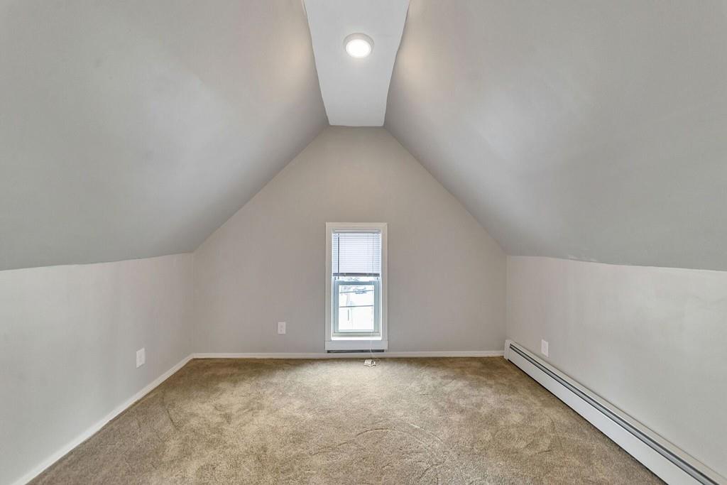 402 Allen Street Springfield, MA 01118 - Photo 22 of 28 wooden floor in an empty room with a window