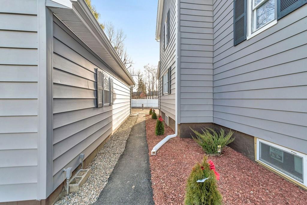 402 Allen Street Springfield, MA 01118 - Photo 4 of 28 a view of a backyard with sitting area