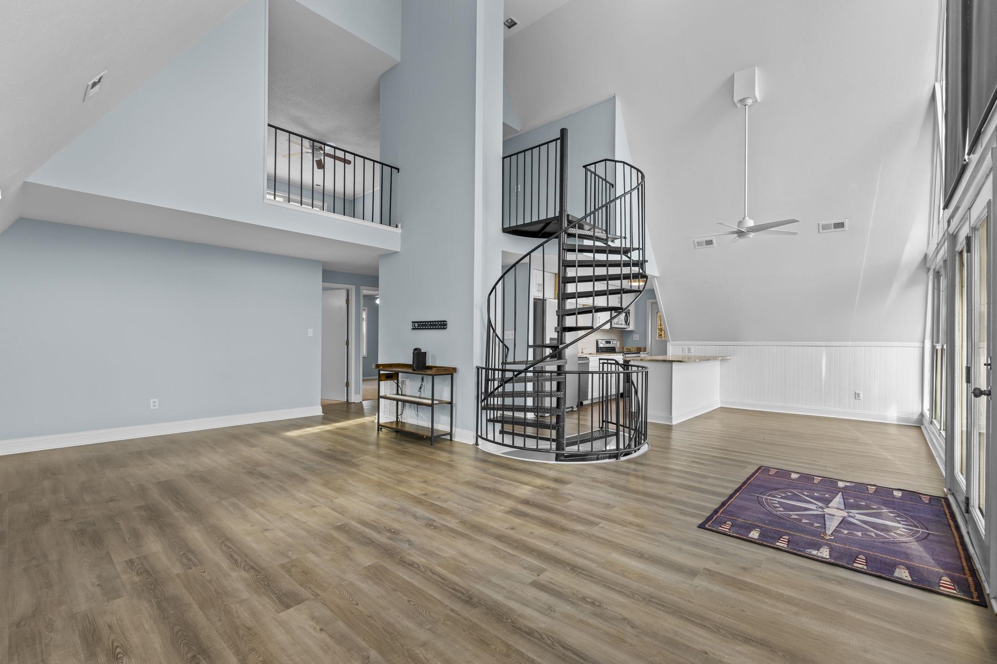 3700 Ed Smith Avenue Myrtle Beach, SC 29588 - Photo 12 of 39 Foyer entrance featuring stairway, a high ceiling, light wood-type flooring, ceiling fan