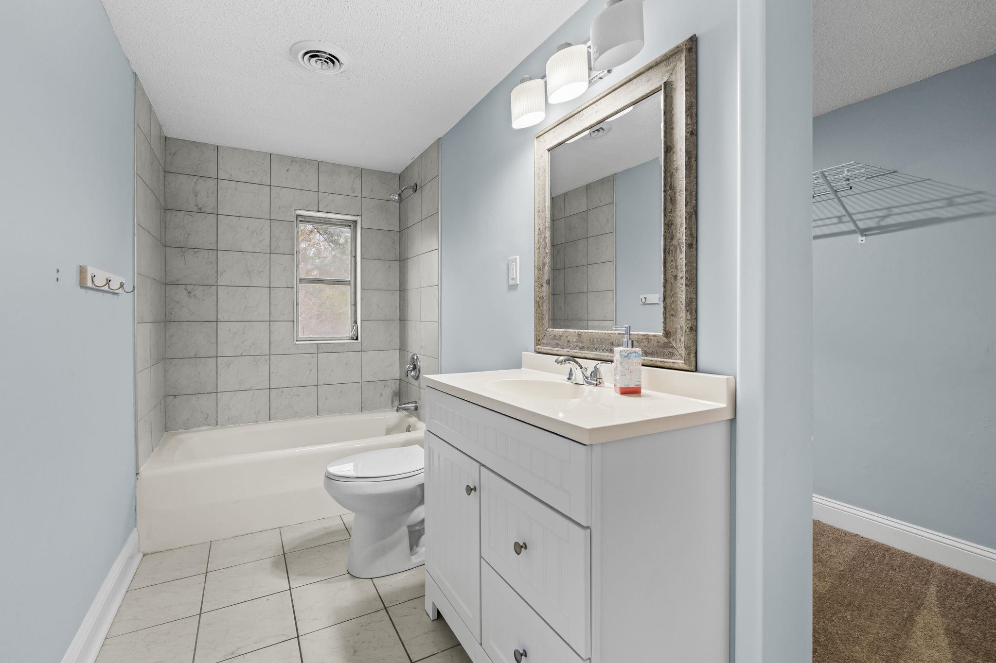 3700 Ed Smith Avenue Myrtle Beach, SC 29588 - Photo 22 of 39 Loft Bathroom with large walk in closet and linen closet