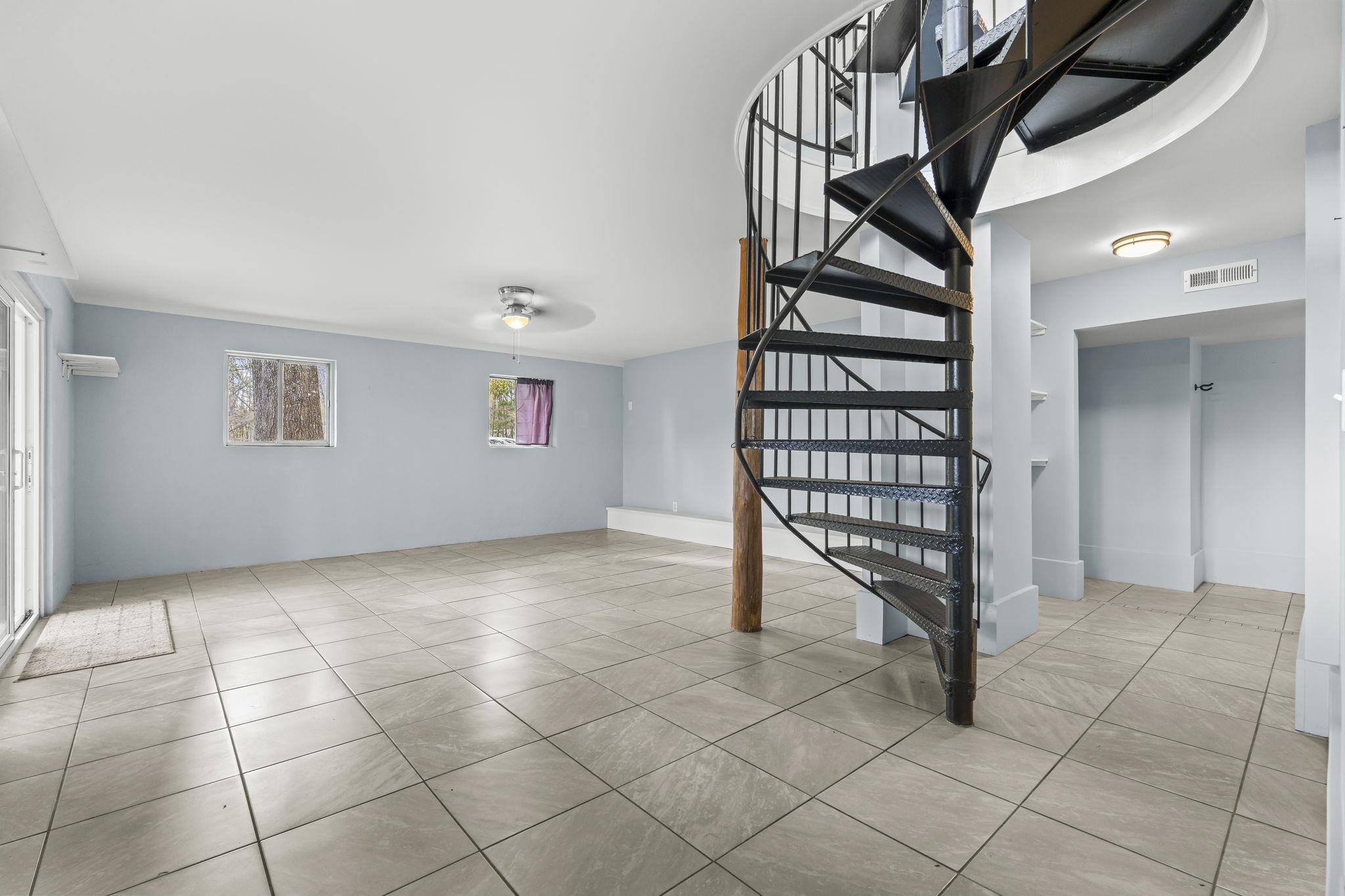 3700 Ed Smith Avenue Myrtle Beach, SC 29588 - Photo 24 of 39 Staircase accessing ground floor -Game Room-Living- Bonus Room