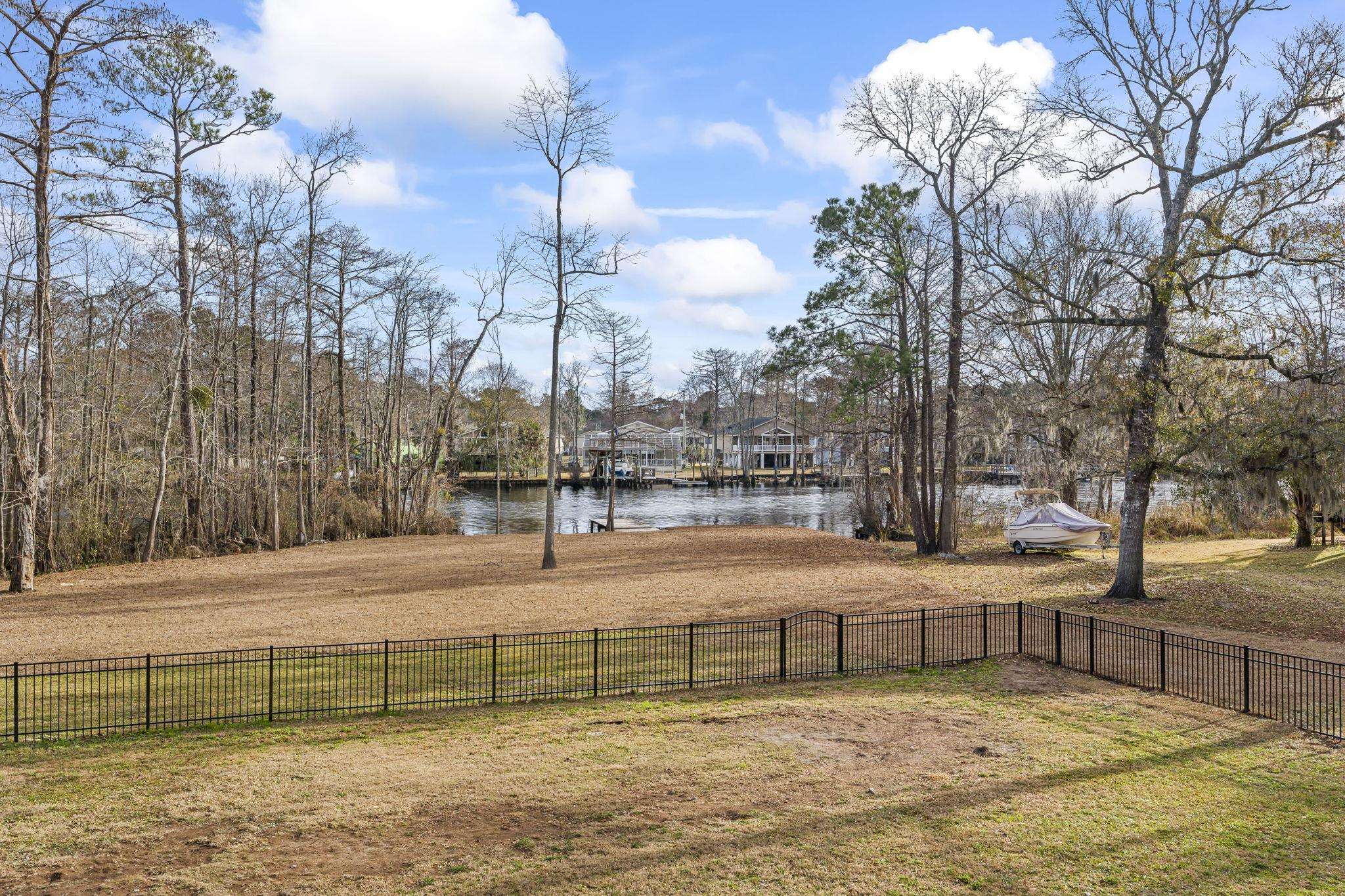 3700 Ed Smith Avenue Myrtle Beach, SC 29588 - Photo 6 of 39 View of yard with fenced in area and water view