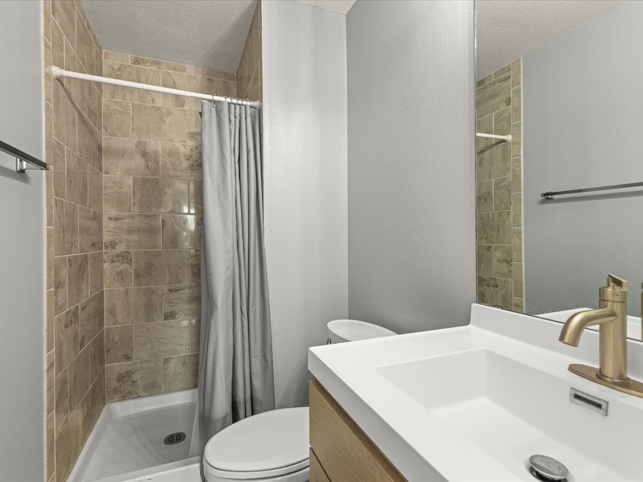 4361 Pfister Lane Roscoe, IL 61073 - Photo 18 of 41 a bathroom with a sink toilet and shower