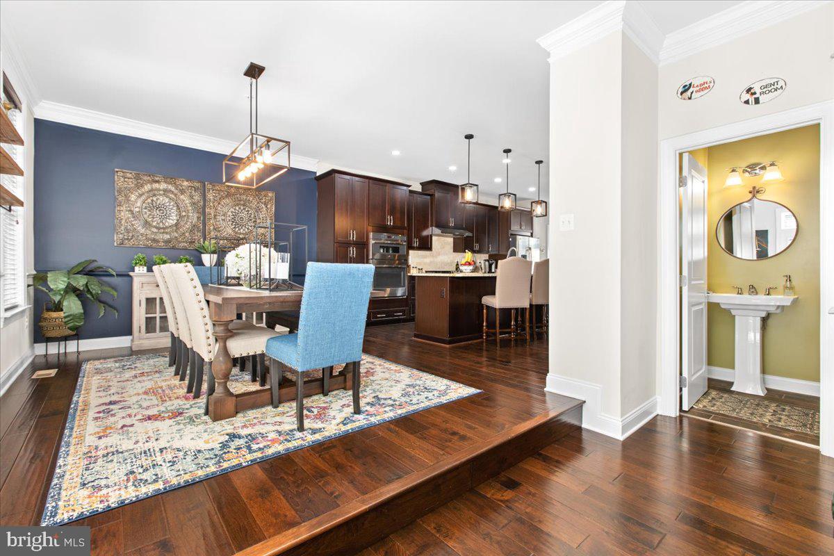 2617 Maple Rock Road Hanover, MD 21076 - Photo 6 of 53 a living room with furniture and wooden floor