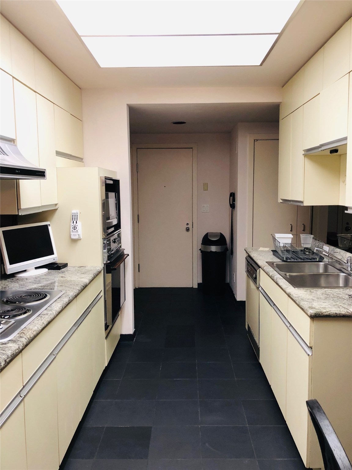 5110 San Felipe Street, Unit 273 Houston, TX 77056 - Photo 5 of 19 a kitchen with a sink stove and refrigerator