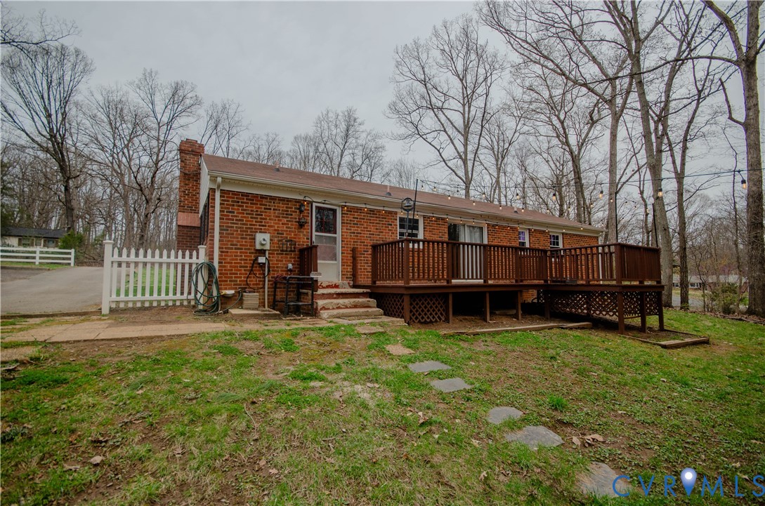 2231 Fall Line Drive Powhatan, VA 23139 - Photo 4 of 23 Rear view of house featuring a chimney, brick sidi