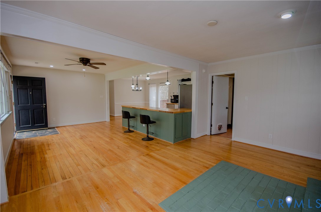 2231 Fall Line Drive Powhatan, VA 23139 - Photo 8 of 23 Unfurnished living room with light wood-style floo