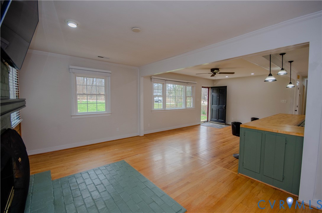 2231 Fall Line Drive Powhatan, VA 23139 - Photo 9 of 23 Living area featuring light wood finished floors,