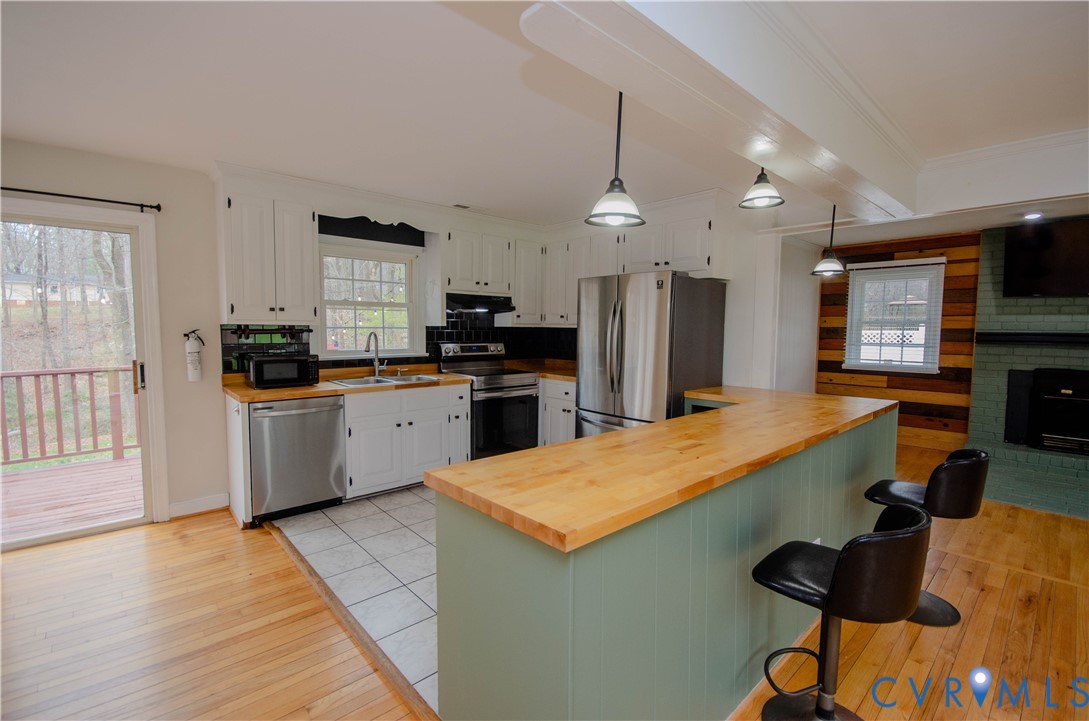 2231 Fall Line Drive Powhatan, VA 23139 - Photo 10 of 23 Kitchen with wooden counters, stainless steel appl