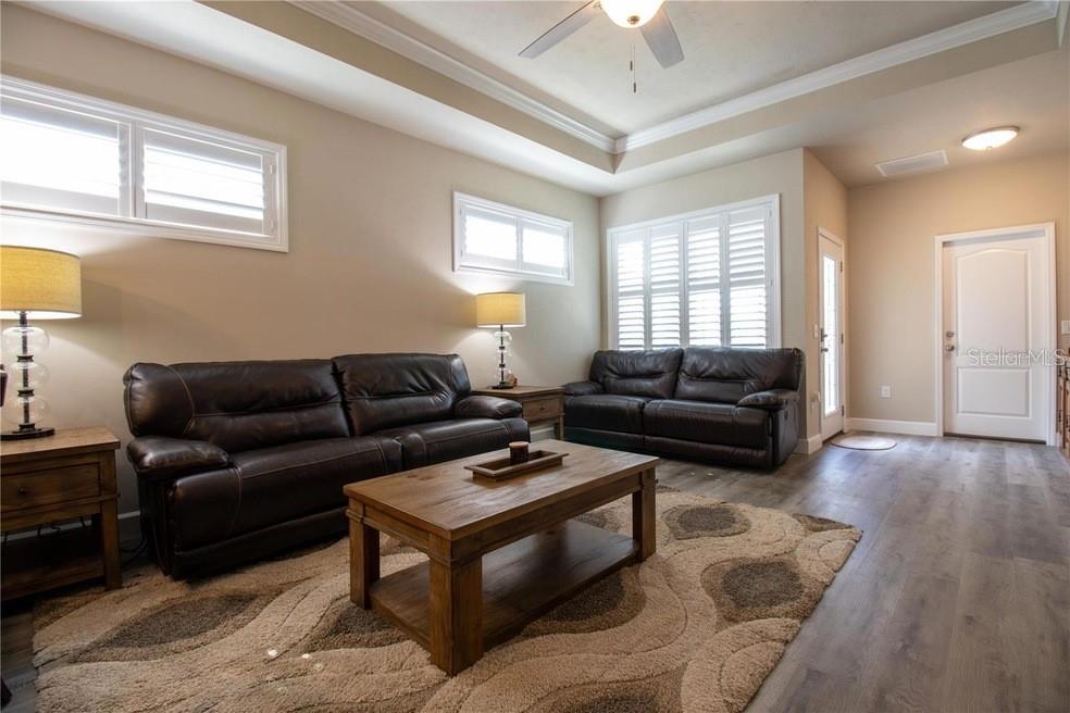 24650 Southwest 17th Place Newberry, FL 32669 - Photo 3 of 19 a living room with furniture and a window