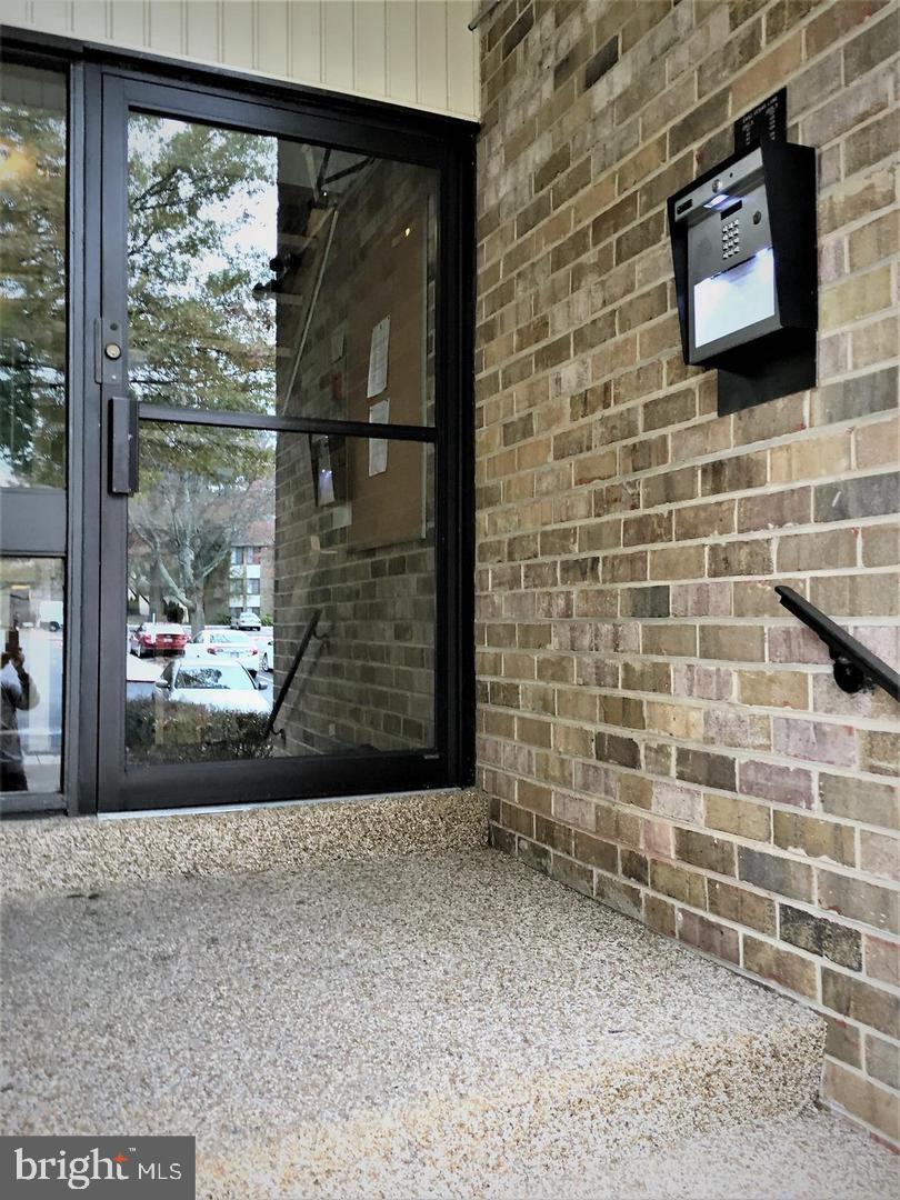 5482 Cedar Lane, Unit B2 Columbia, MD 21044 - Photo 2 of 23 a view of front door
