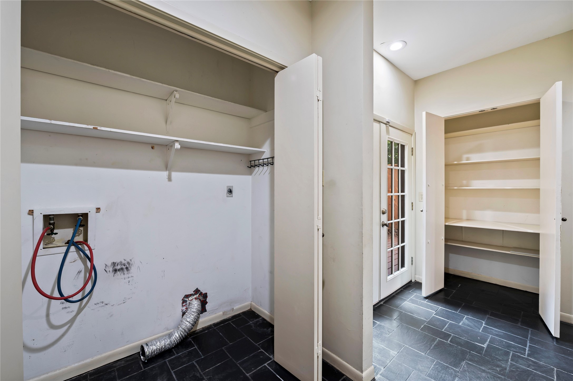 5300 Mercer Street, Unit 7 Houston, TX 77005 - Photo 15 of 41 Washer and dryer hookups next to garage, large pantry