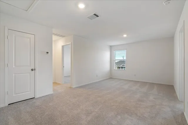 a bathroom with a shower and toilet