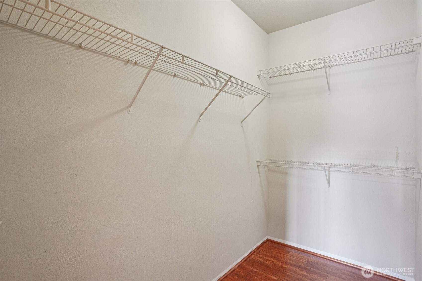 2800 Southeast 8th Street, Unit 2132 Renton, WA 98058 - Photo 11 of 24 a view of a room with racks on the wall