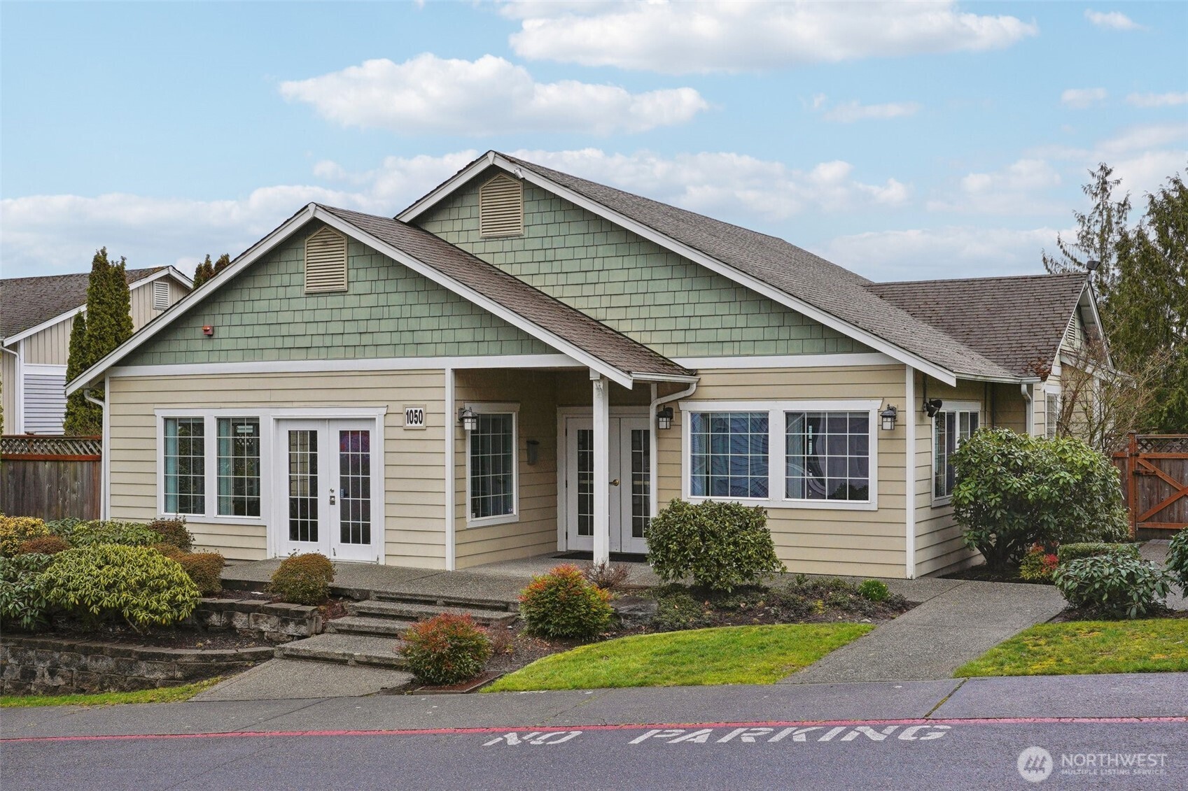 2800 Southeast 8th Street, Unit 2132 Renton, WA 98058 - Photo 18 of 24 front view of a house with a yard