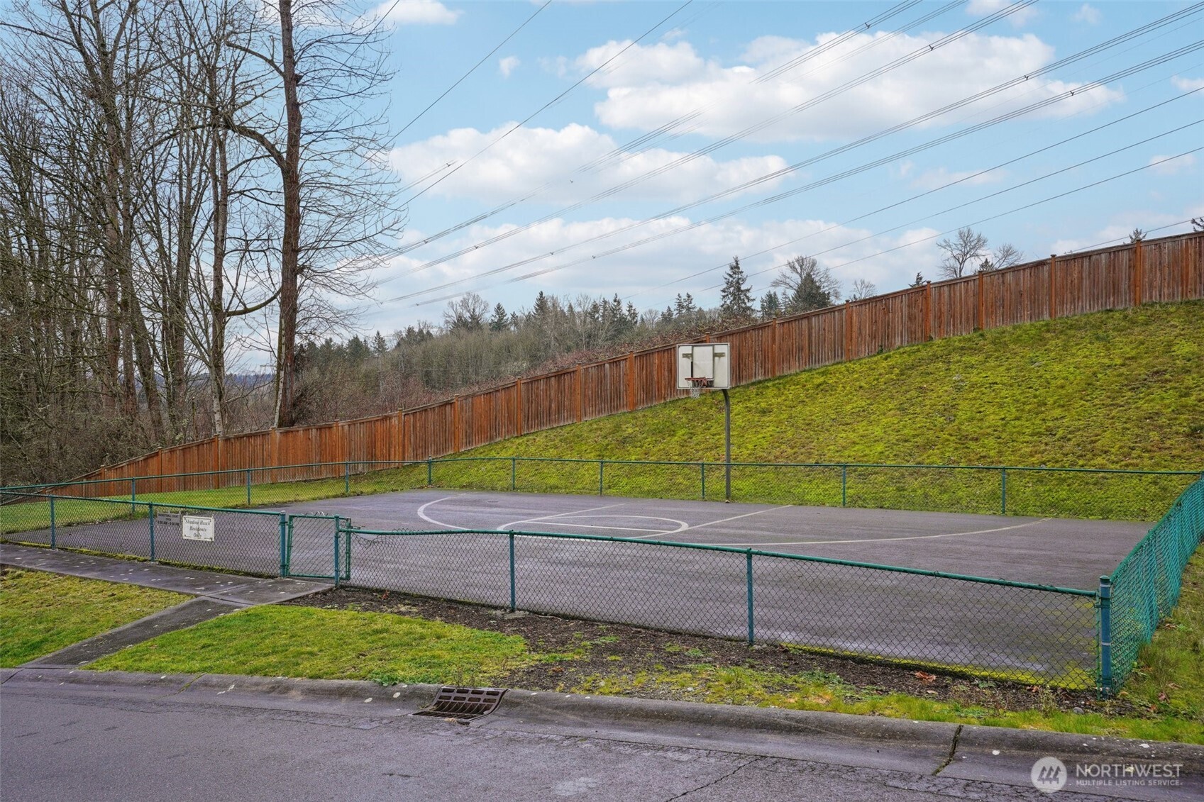 2800 Southeast 8th Street, Unit 2132 Renton, WA 98058 - Photo 20 of 24 a view of a back yard with a bench