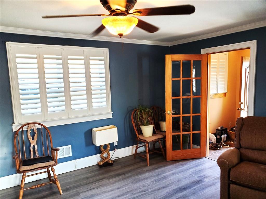 702 Meridian Road Renfrew, PA 16053 - Photo 3 of 21 a view of a livingroom with furniture and a window