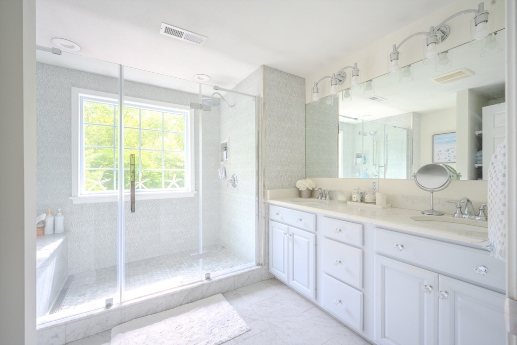 64 Jacques Road Tyngsboro, MA 01879 - Photo 22 of 39 a bathroom with a granite countertop sink mirror and double