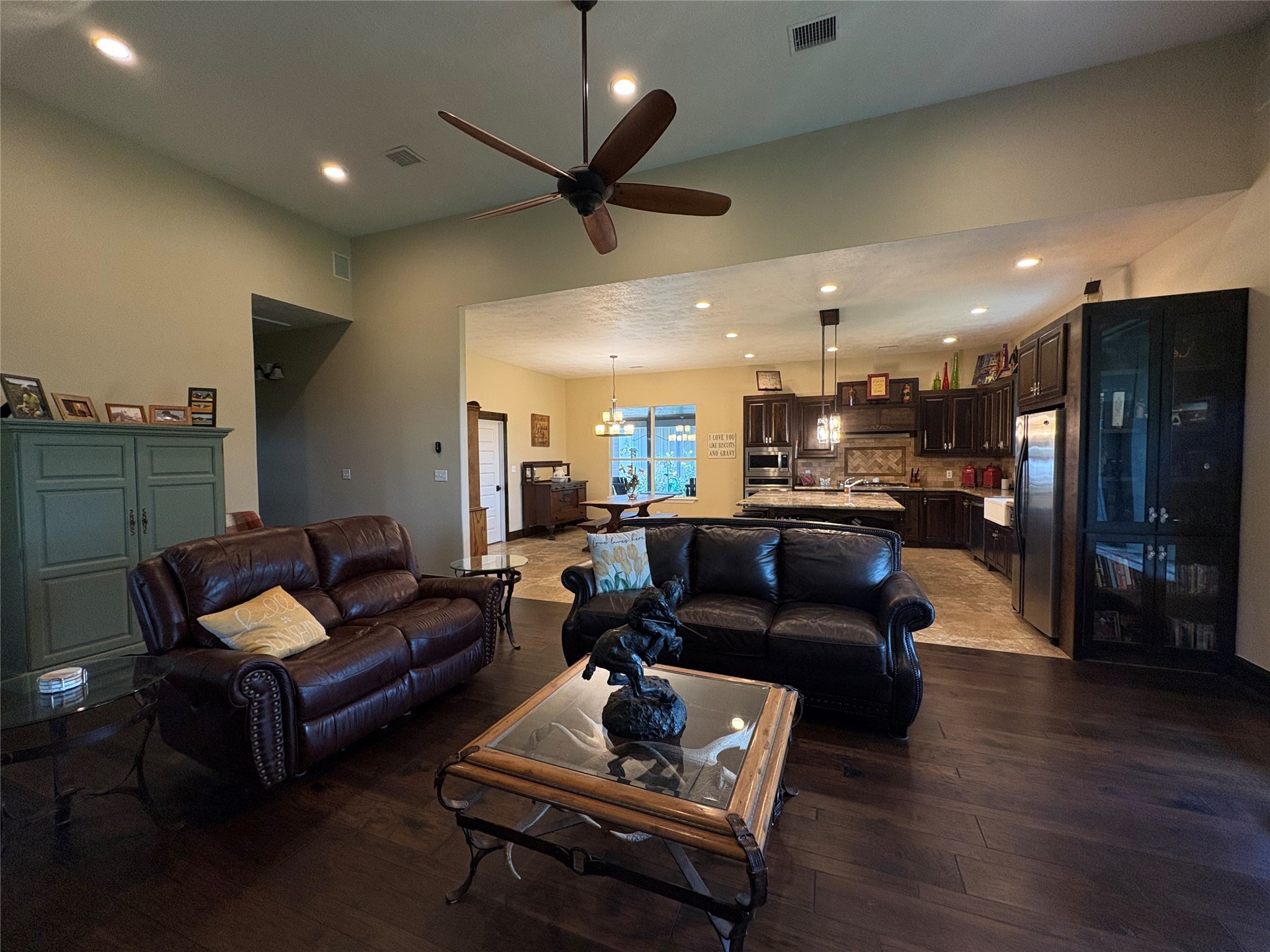8595 Jared Road Bellville, TX 77418 - Photo 14 of 30 a living room with furniture and wooden floor