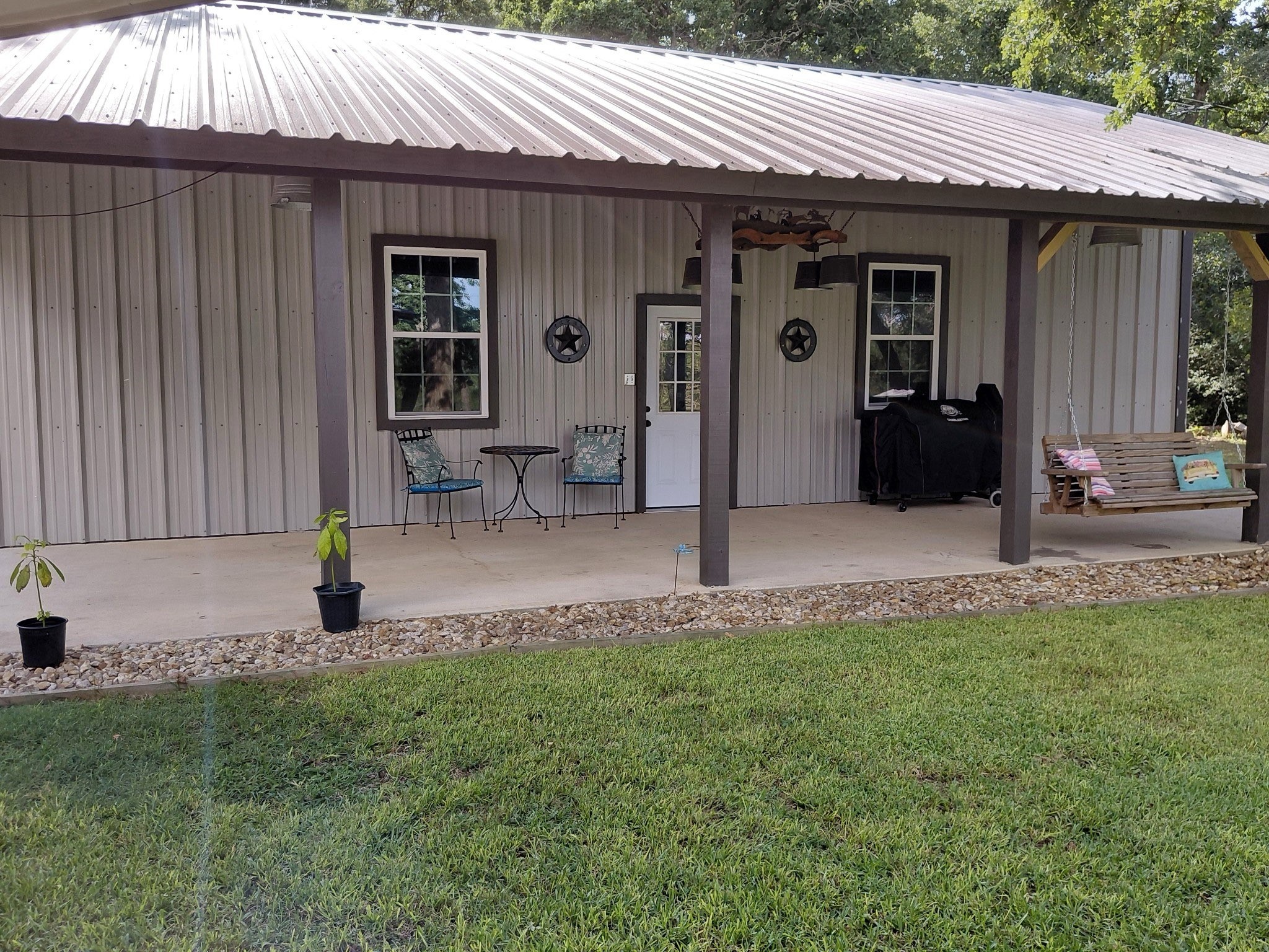 8595 Jared Road Bellville, TX 77418 - Photo 6 of 30 a front view of a house with garden