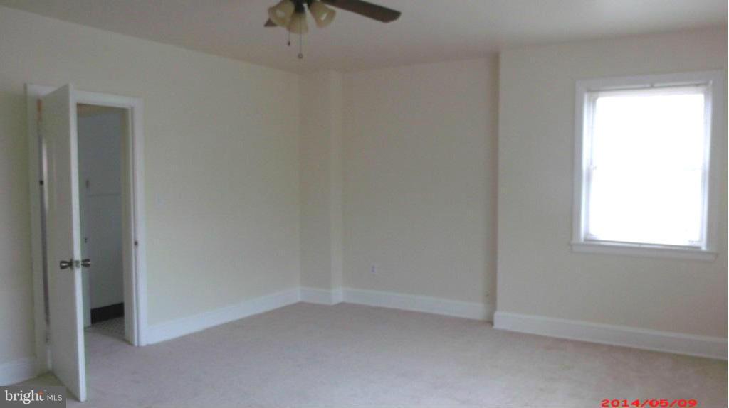 3712 Kimble Road Baltimore, MD 21218 - Photo 14 of 30 an empty room with a window