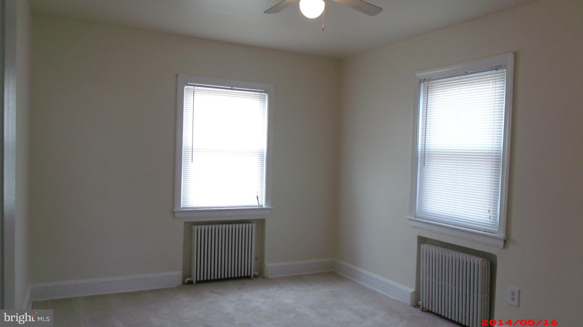 3712 Kimble Road Baltimore, MD 21218 - Photo 15 of 30 an empty room with windows