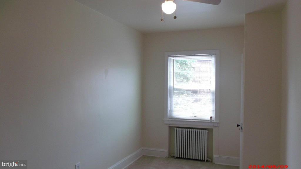 3712 Kimble Road Baltimore, MD 21218 - Photo 16 of 30 an empty room with a window