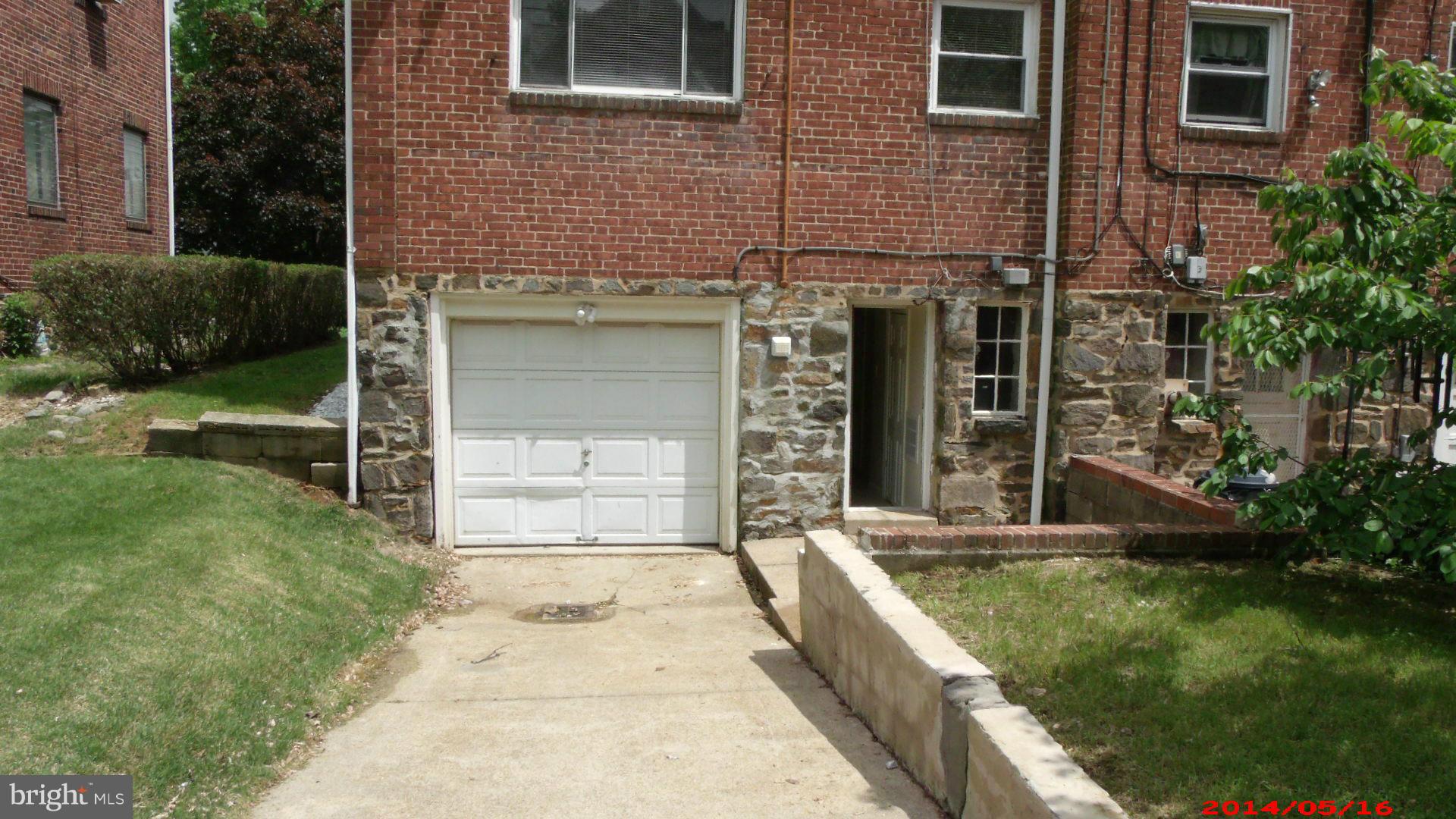 3712 Kimble Road Baltimore, MD 21218 - Photo 30 of 30 a front view of a house with a yard