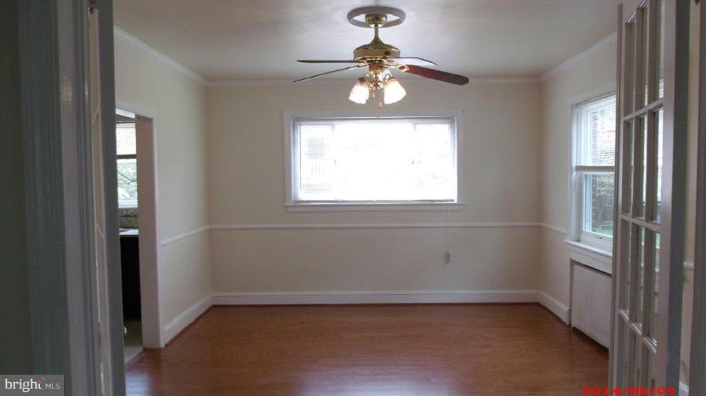 3712 Kimble Road Baltimore, MD 21218 - Photo 9 of 30 a view of an empty room with a window