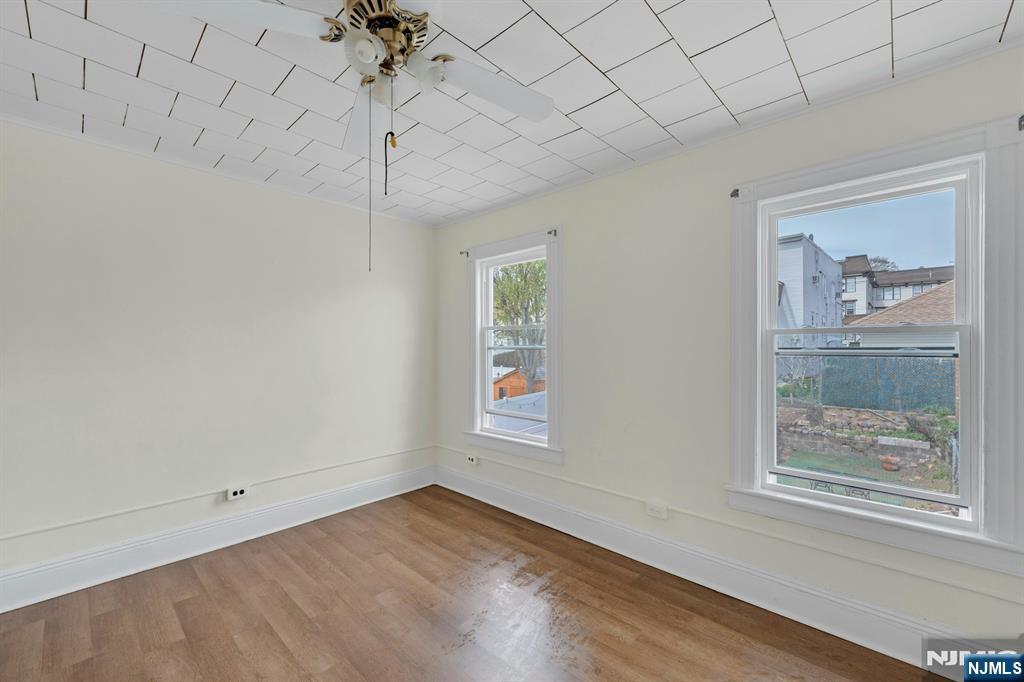 331 1/2 Forest Street Kearny, NJ 07032 - Photo 5 of 17 a view of an empty room with a window
