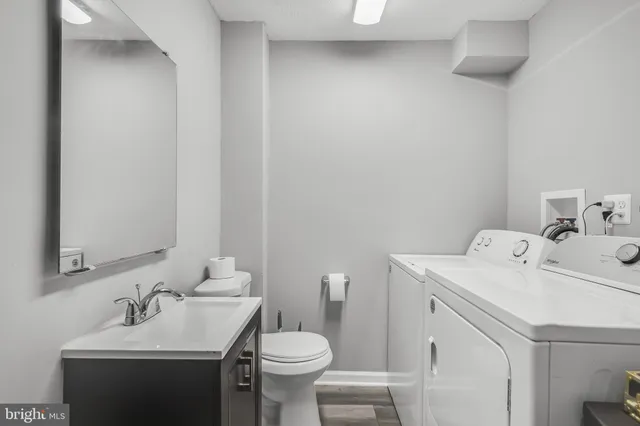 a bathroom with a sink and a toilet