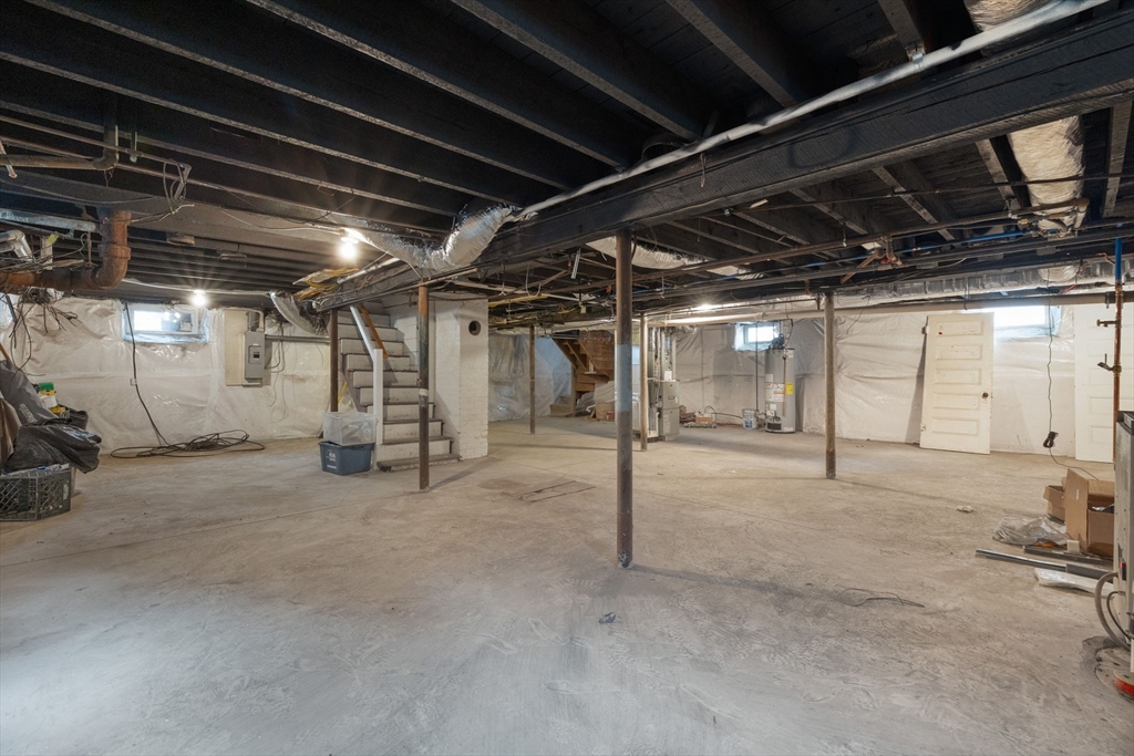 16 Clarkwood Street, Unit 2 Boston, MA 02126 - Photo 33 of 34 a view of empty room with wooden walls