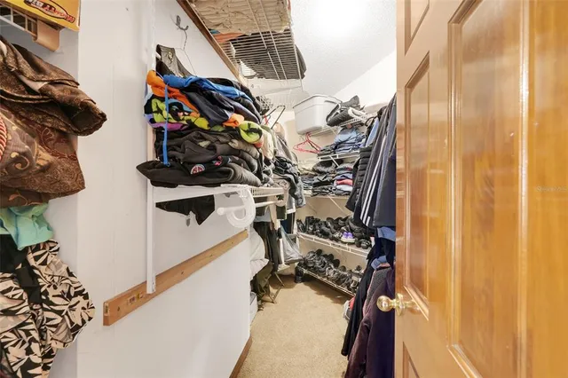 a workspace with furniture cabinet and window