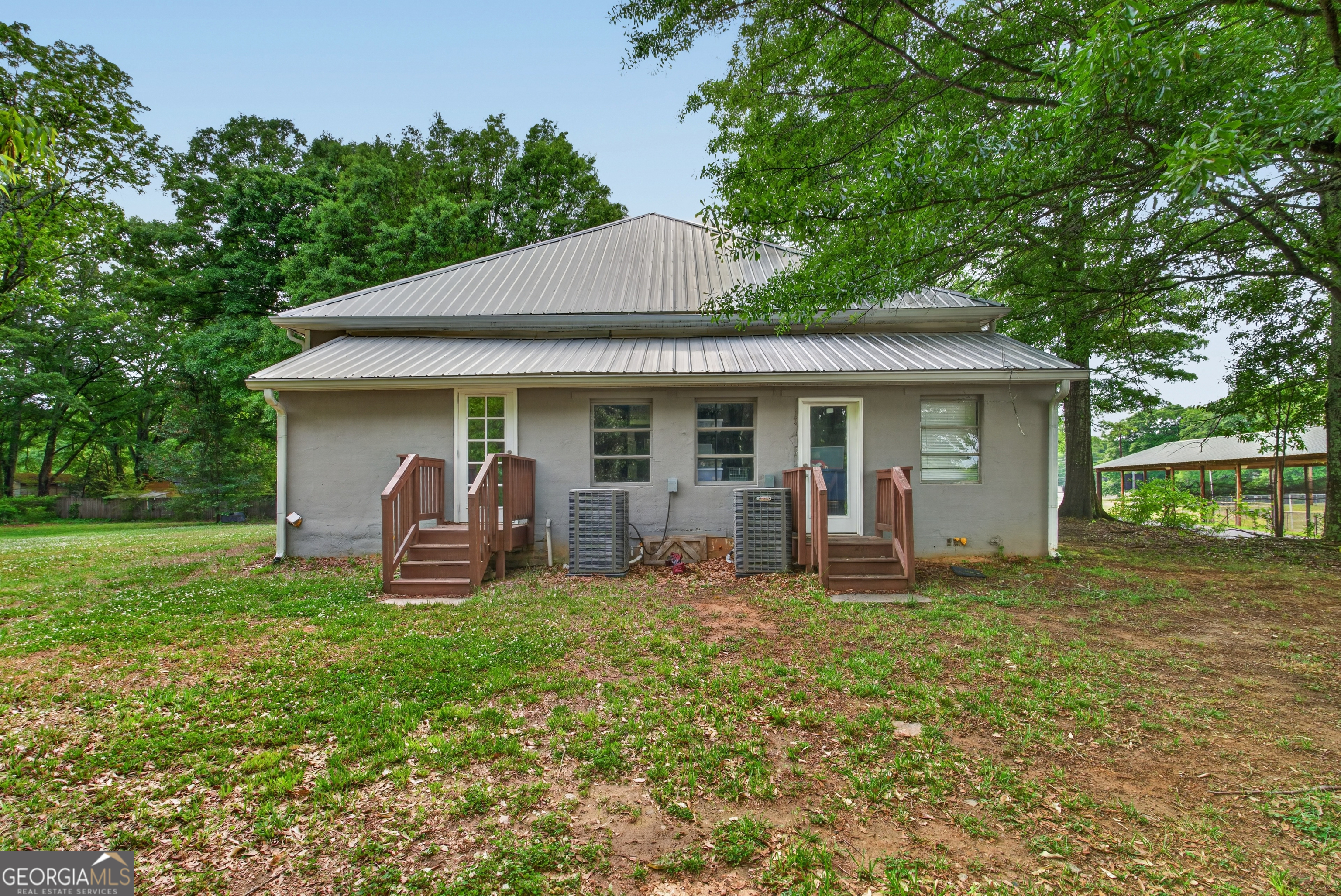 49 Milner Street Temple, GA 30179 - Photo 2 of 32 a front view of house with yard patio and green space