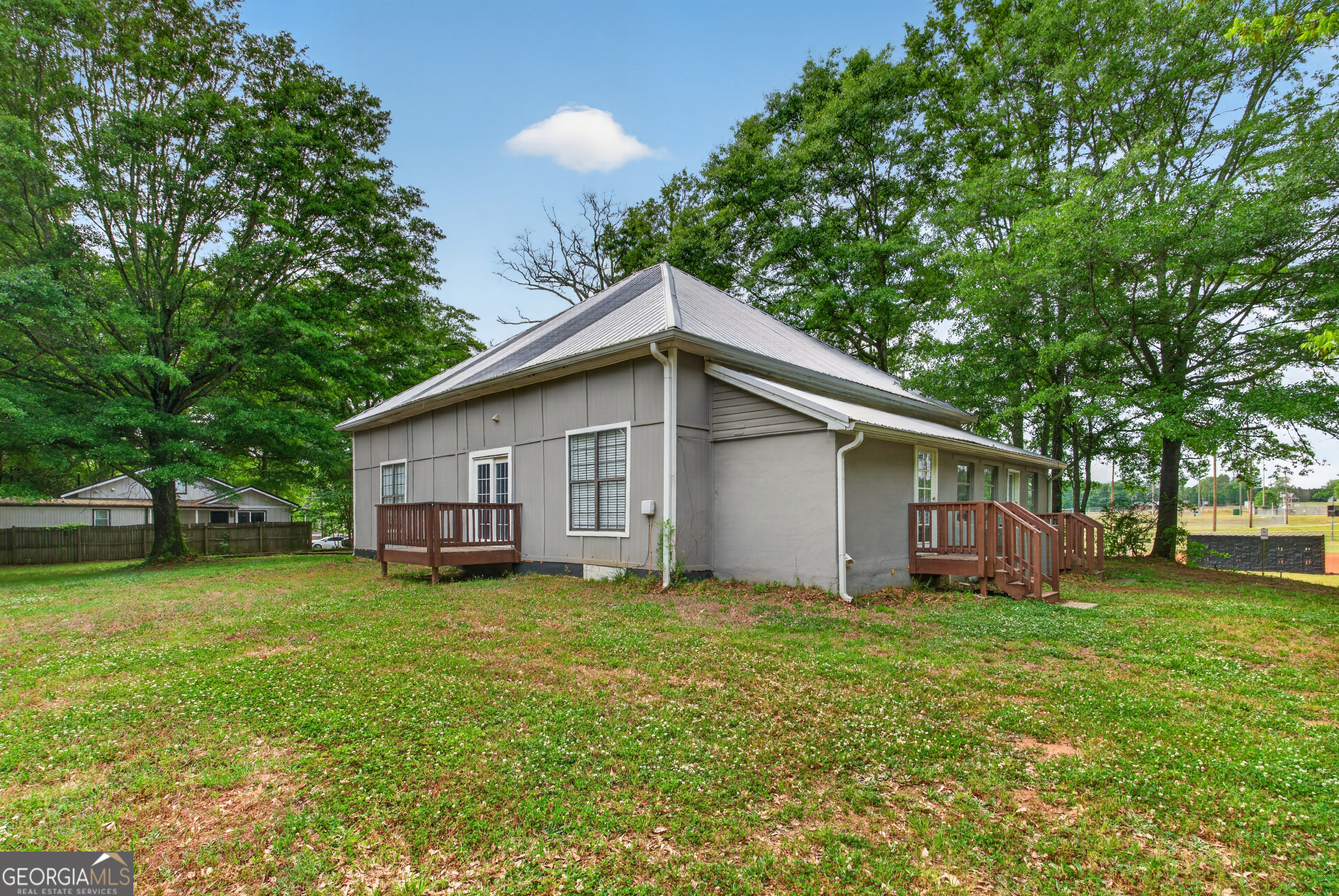 49 Milner Street Temple, GA 30179 - Photo 25 of 32 a view of a house with a yard