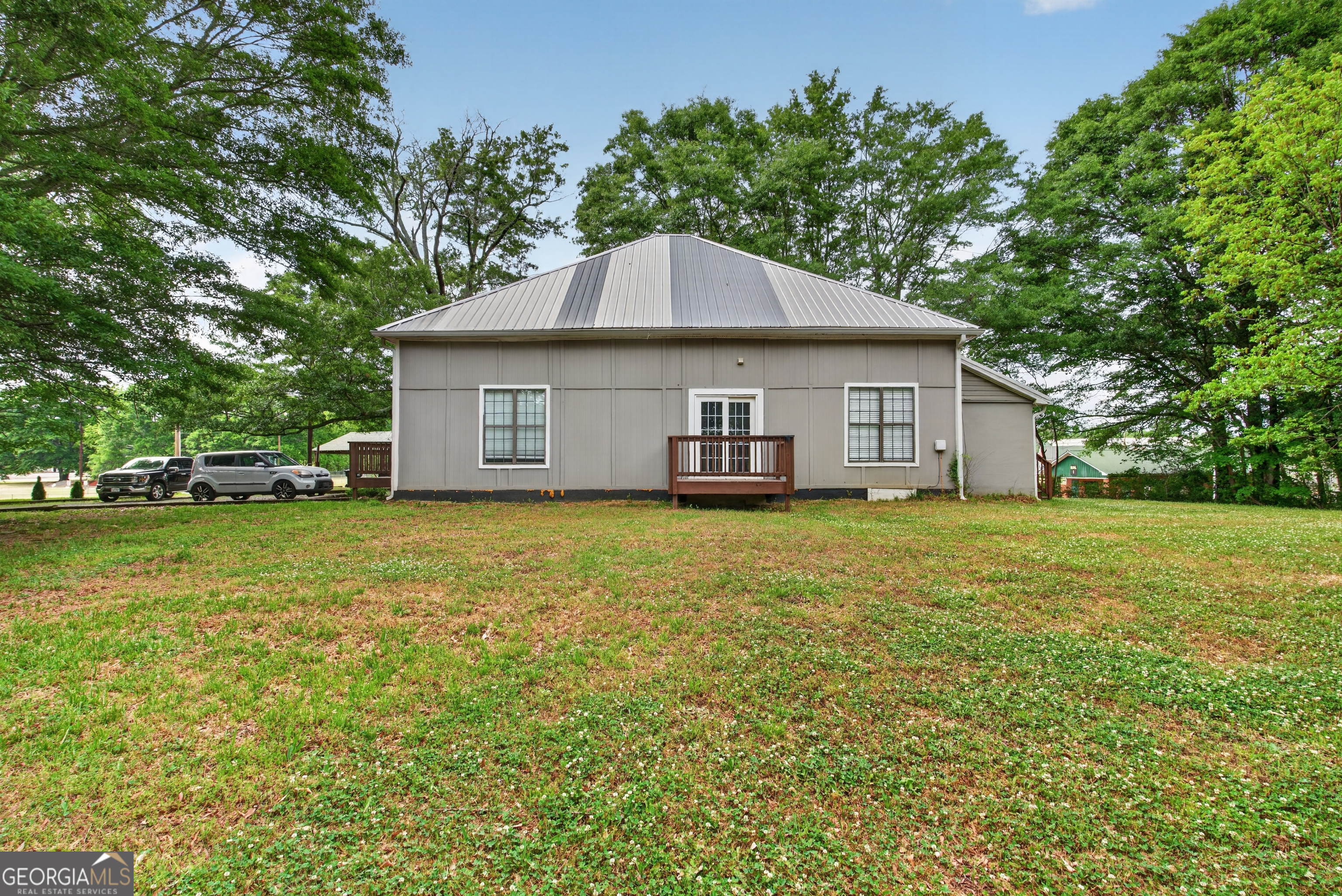 49 Milner Street Temple, GA 30179 - Photo 26 of 32 a front view of a house with a garden