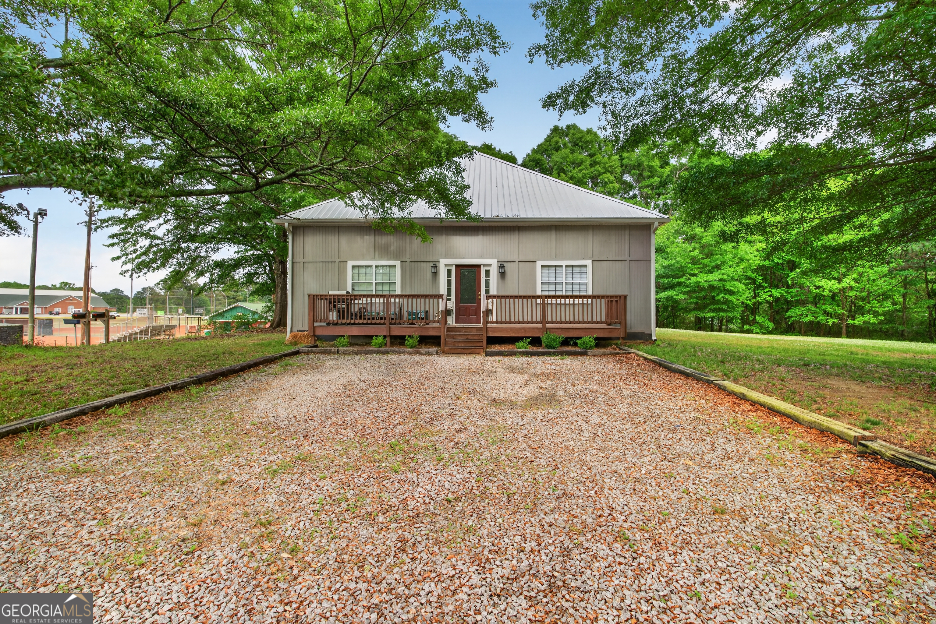 49 Milner Street Temple, GA 30179 - Photo 29 of 32 a view of a house with a yard and large tree