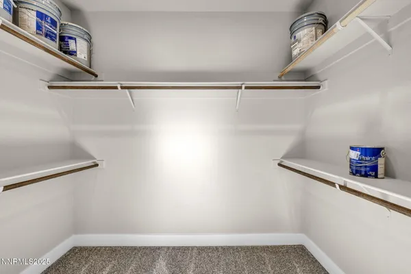 a view of a room with rack on the wall