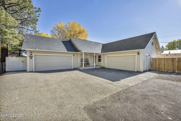 a view of a house with a garage and a garage