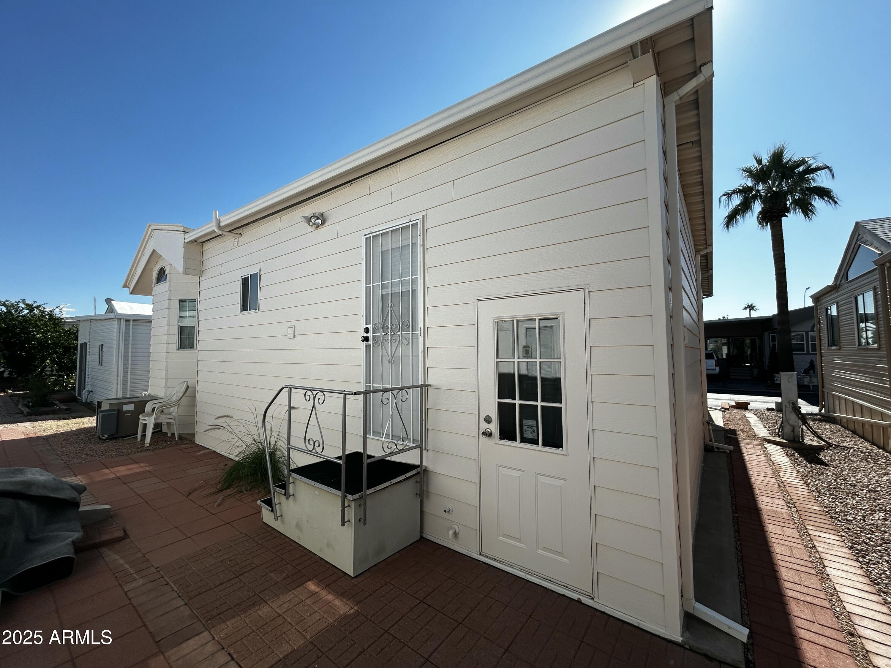 111 South Greenfield Road, Unit 596 Mesa, AZ 85206 - Photo 22 of 26 a view of terrace with sitting area