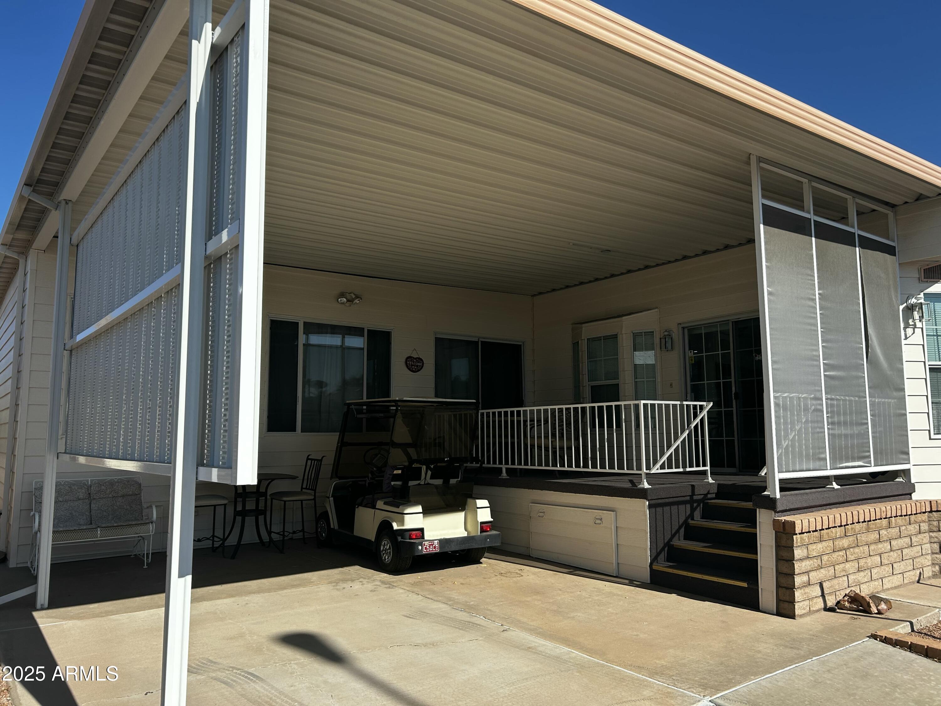 111 South Greenfield Road, Unit 596 Mesa, AZ 85206 - Photo 5 of 26 a view of outdoor space and deck