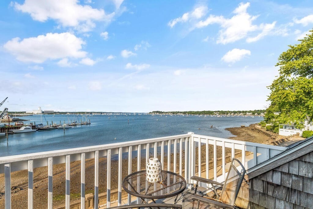 1 Shore Avenue Salem, MA 01970 - Photo 25 of 42 a view of a lake with a terrace