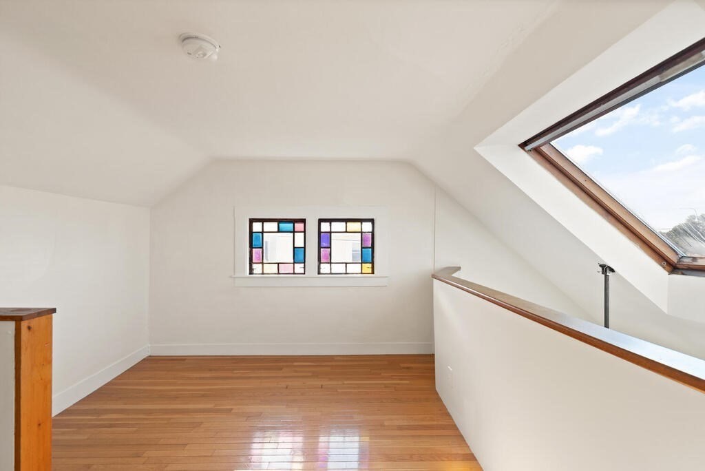 1 Shore Avenue Salem, MA 01970 - Photo 29 of 42 a view of an empty room with wooden floor and a window