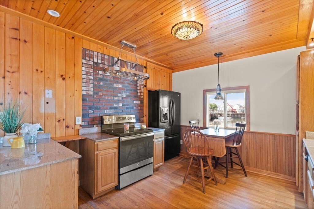 1 Shore Avenue Salem, MA 01970 - Photo 9 of 42 a view of a dining room with furniture window and wooden floor
